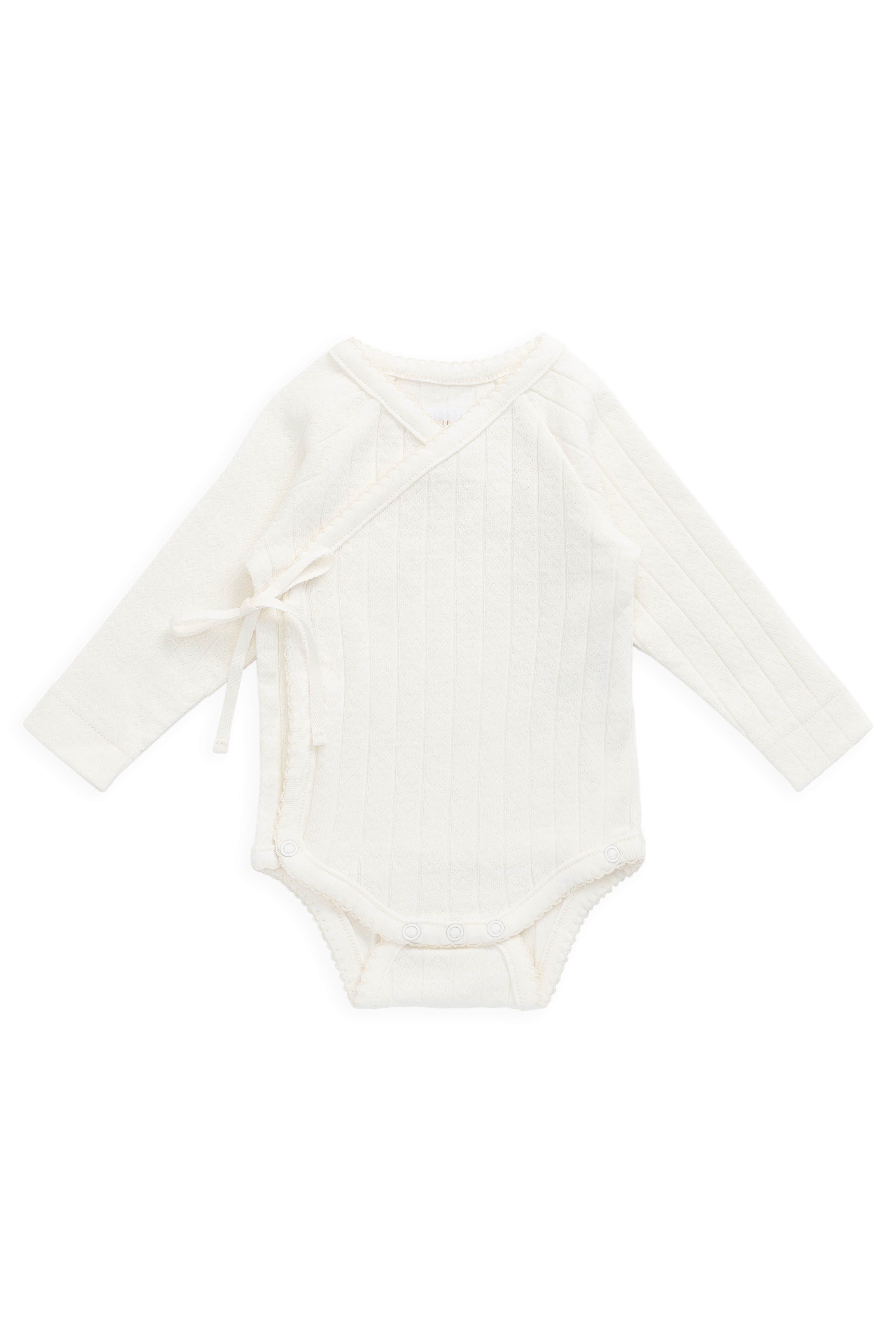 Bodysuit romantique en coton parcheminé et élasthanne avec imprimé cœurs ajourés et devant cache-cœur