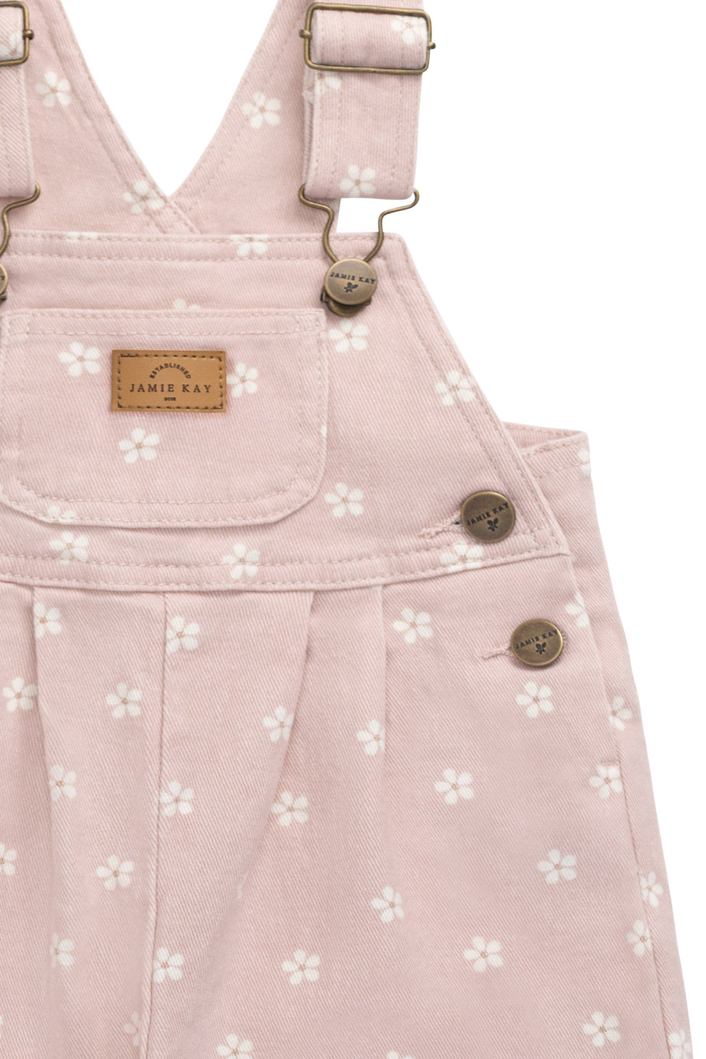 Salopette en coton rose à motif floral romantique avec bretelles réglables et poche sur la poitrine