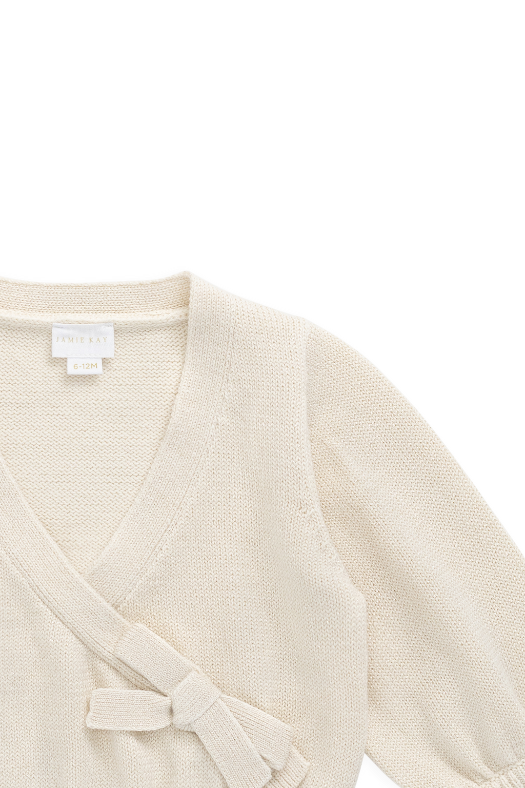 Gilet élégant en coton crème et lurex, avec cache-cœur et manches ballon