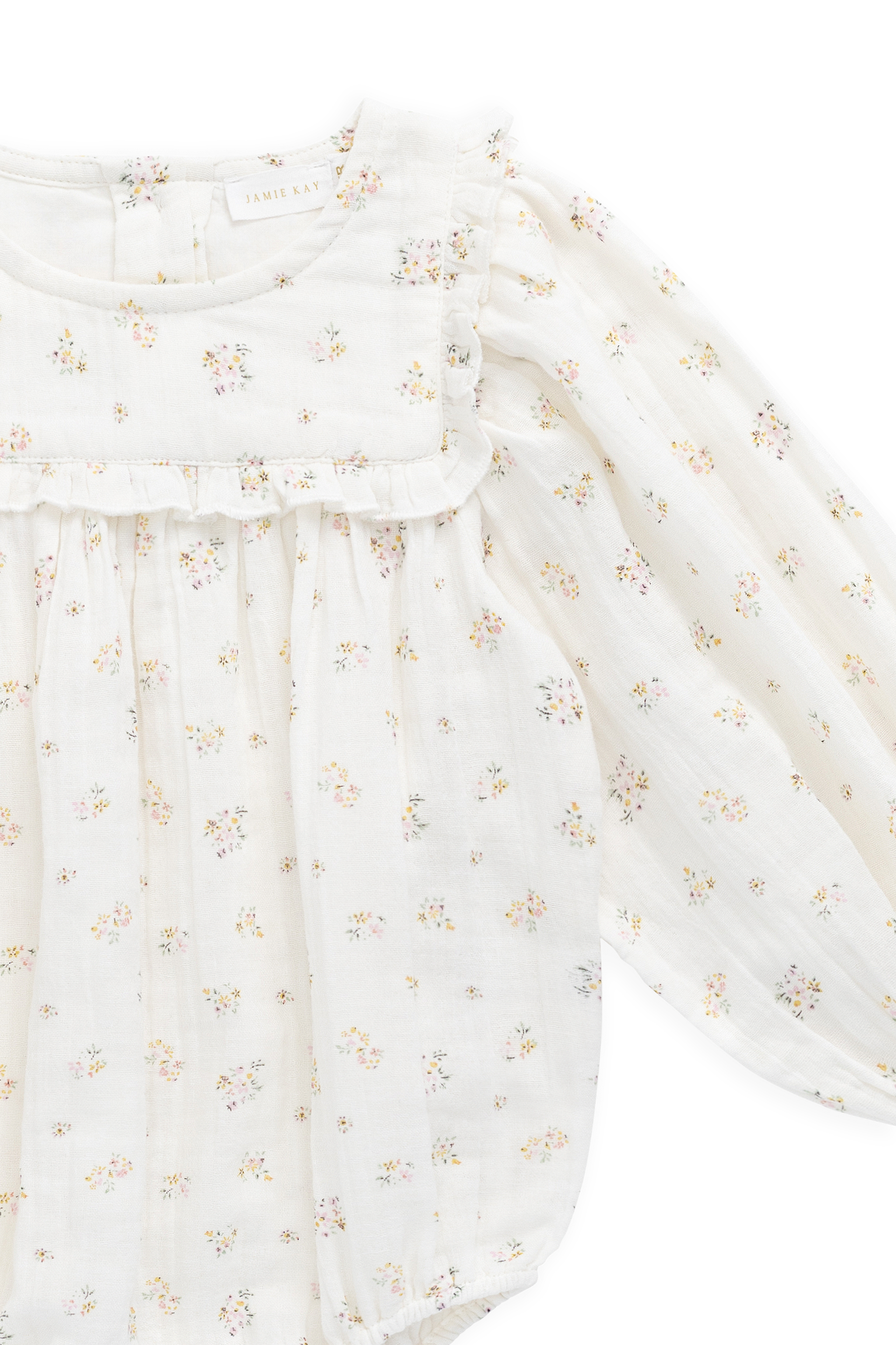 Barboteuse romantique en coton biologique à imprimé floral avec manches bouffantes longues et encolure volantée