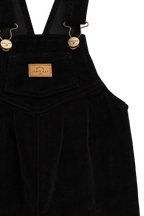 Salopette classique en coton noir sésame avec bretelles réglables et entrejambe à boutons-pression