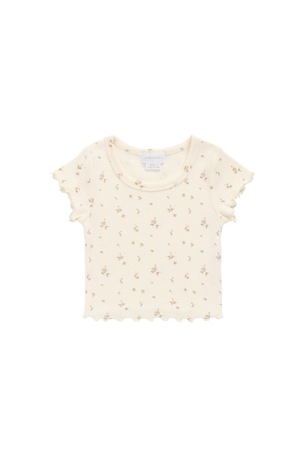 Haut romantique en modal et coton à fleurs crème avec texture finement côtelée et bords festonnés